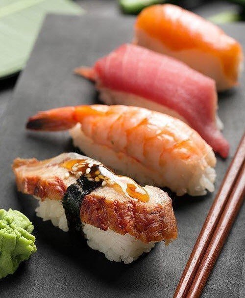 Fresh nigiri sushi platter with shrimp, tuna, salmon and unagi at Sushi Fans Cafe