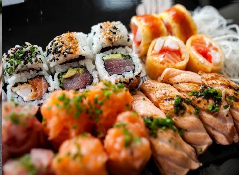 Assorted sushi rolls with tuna, salmon and grilled toppings